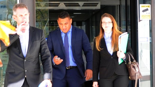 Axed: Canberra Raider Josh Papalii (centre) leaving the ACT Magistrates Court before his sacking from the Kangaroos.