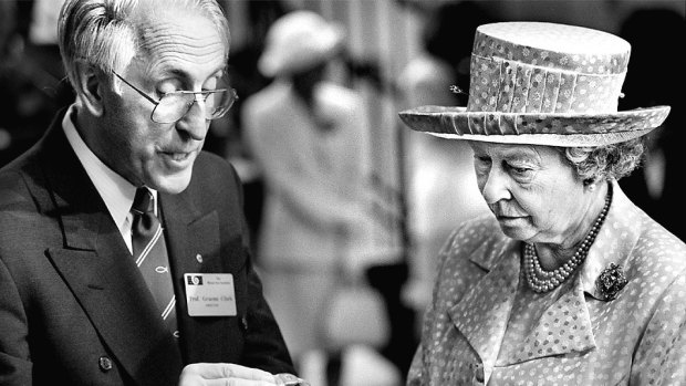 The Queen at the Bionic ear institute being shown the implant by Dr Graeme Clark.