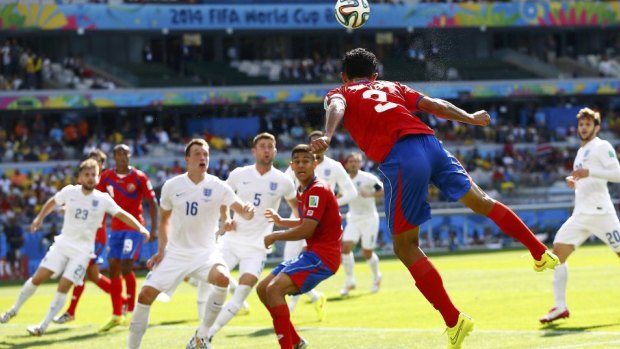 Dull draw: Costa Rica's Giancarlo Gonzalez heads the ball.