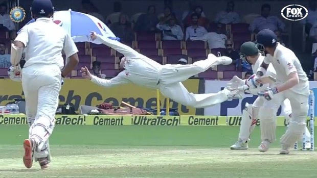 Hot chance: Steve Smith takes a flying catch to dismiss India's Lokesh Rahul.