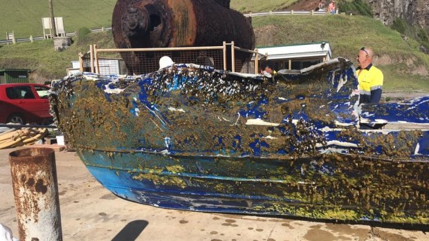 The battered hull of the fishing vessel.