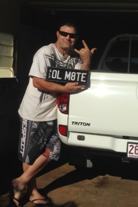 Aaron Taylor with his number plate 'OL M8TE'.