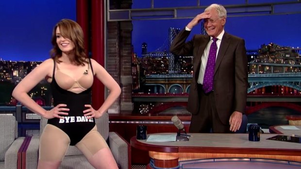 Standing ovation: Tina Fey strips down to a farewell message on The Late Show with David Letterman.