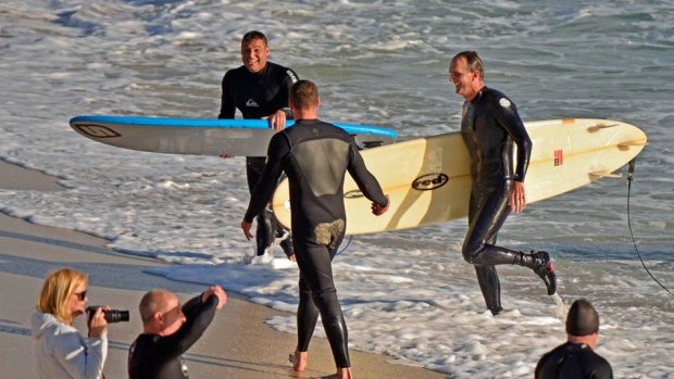 The surfers were "pretty buzzed" by their close encounter. 