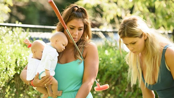 The Bachelor Australia contestants with their baby simulators. 