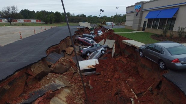 The giant sinkhole in the IHOP carpark. 