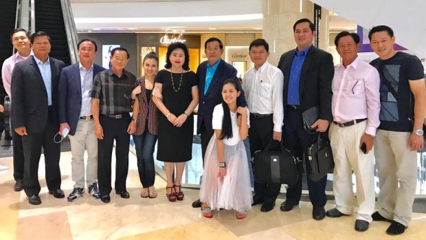 Hun Sen with family and friends in a Singapore mall this week. 