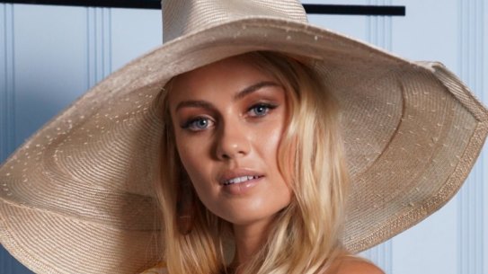 Myer Ambassador Elyse Knowles brings the sunshine to a wet Melbourne Cup and wears Acler two-piece set and Melissa Jackson hat.