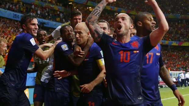 The Dutch celebrate their stunning win.