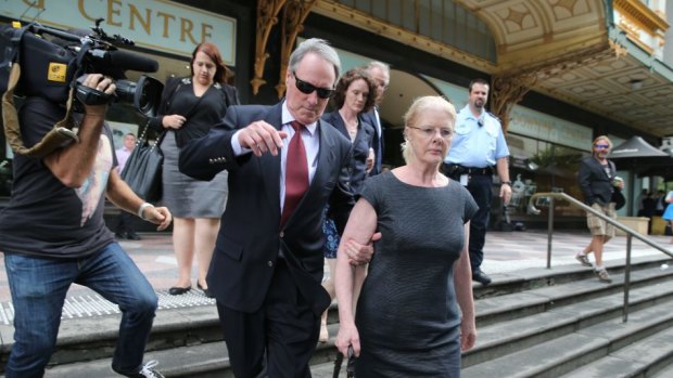 Robert Hughes leaves Downing Centre Local Court with his wife Robyn Gardiner during his trial on sex charges. His appeal against conviction has been rejected.