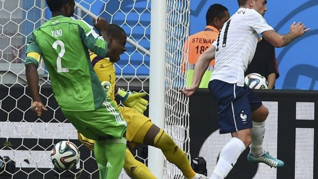 Game clincher: Nigeria's Joseph Yobo scores an own goal.