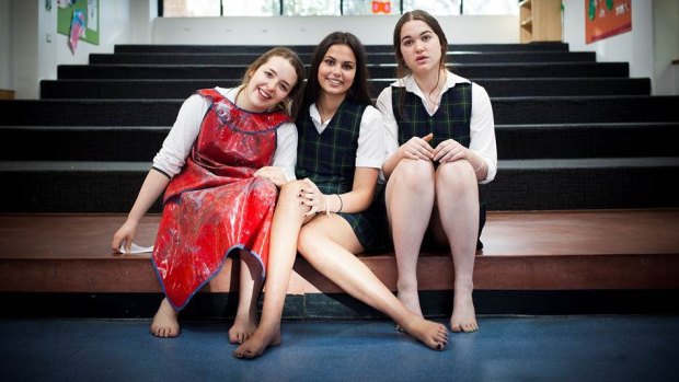 HSC over: Sophia Miller Hamor, Freya Krishnan and Hestea Cook recreate their pose of 2002 when they began school.