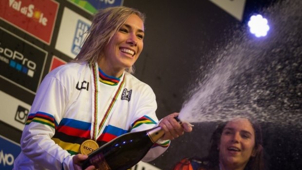 Caroline Buchanan celebrates her mountain bike world title in Italy.