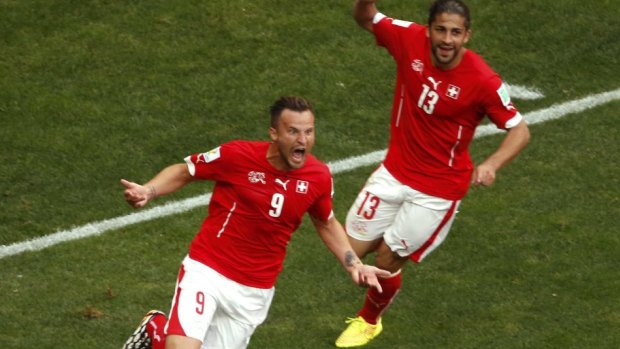 Late drama: Switzerland's Haris Seferovic celebrates after scoring the winner.