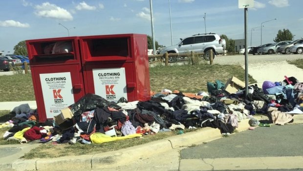 Charity bins in Gungahlin Place, with rubbish dumped illegally, photographed by a member of the public.