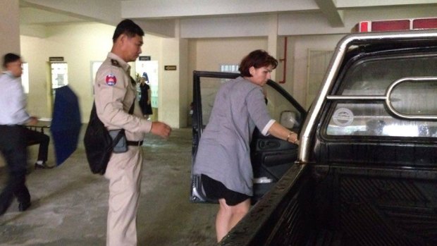 Tammy Davis-Charles arrives at a Phnom Penh court on Tuesday. 