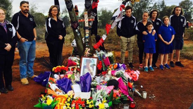 Members of the Kalgoorlie City Football club pay their respects to Elijah Doughty.