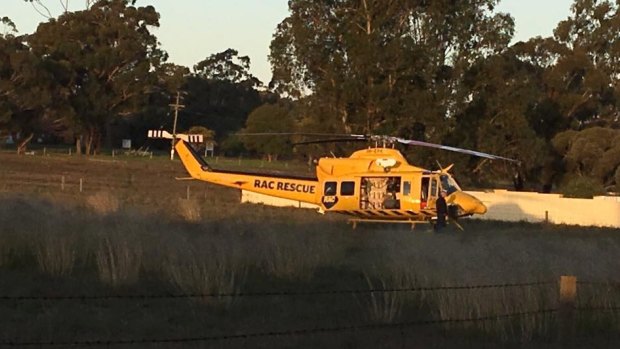 The RAC helicopter lands near Katanning after a boy died while riding a motorcycle. 