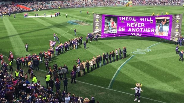 Fond farewell: A guard of honour is prepared for Matthew Pavlich for his final game for Fremantle at Domain Stadium.