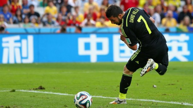 David Villa flicked Spain in front.