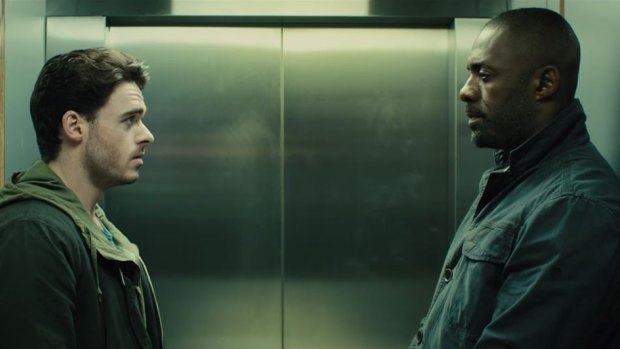 Richard Madden, left, and Idris Elba are unlikely allies in their quest to track down terrorists in <i>Bastille Day</i>.