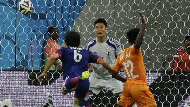 Wilfried Bony heads the equaliser for the Ivory Coast.