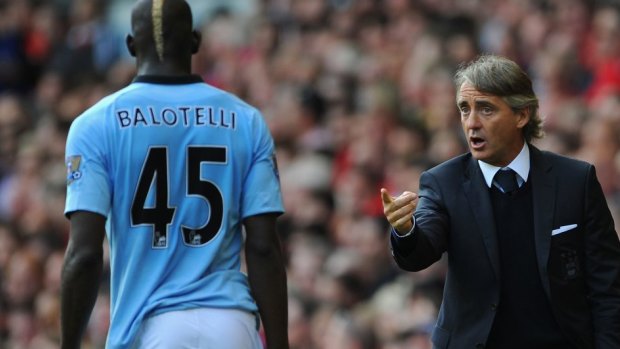 Father figure: Roberto Mancini managed Balotelli at both Manchester City and Inter Milan.