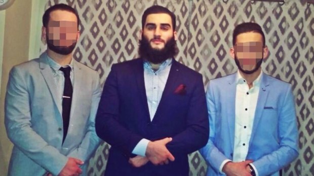 Former Epping Boys High student Tamim Khaja (centre) was arrested by counter terrorism police.