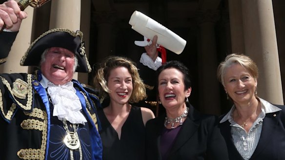 In better days: Town crier Graham Keating, Jess Miller, Sydney Lord Mayor Clover Moore and Professor Kerryn Phelps on the steps of Town Hall at the proclamation of the 2016 council.