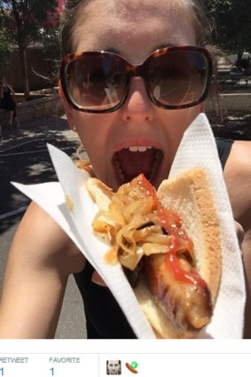 A Twitter user shows off her purchase from a sausage sizzle at a polling booth. 