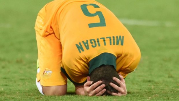 Injury blow: Mark Milligan will miss the match with the Netherlands.