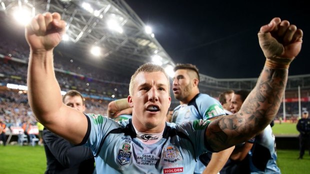 Did that really happen? Blues halfback Trent Hodkinson celebrates in 2014.