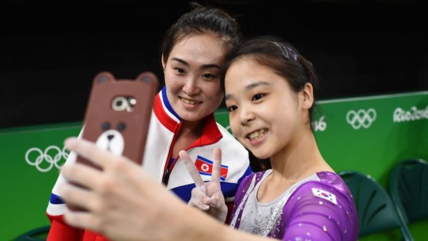 South Korean gymnast Lee Eun-ju and her North Korean rival Hong Un-jong stop for a selfie in Rio during training.