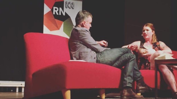Clementine Ford breastfeeding onstage while speaking to Radio National's Big Ideas.