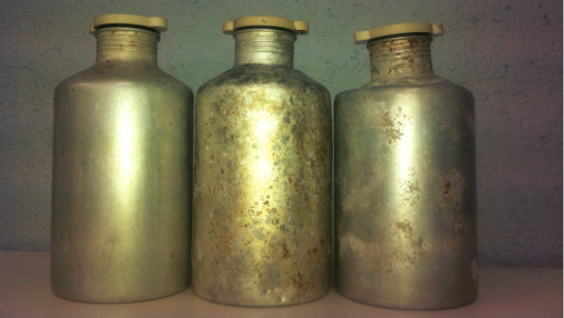 Three canisters containing aluminium phosphate that are belived to have fallen off, or were dumped, by a shipping vessel in the Pacific Ocean.