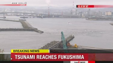 The water is seen rushing out to sea at Port of Onahama. 