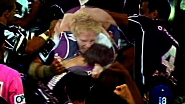 Infamous incident: James Graham was banned for biting Billy Slater in the 2012 grand final.