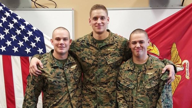 US Marine Nathan Ordway (right), pictured with fellow soldiers including Corporal Joel Eicher (centre).
