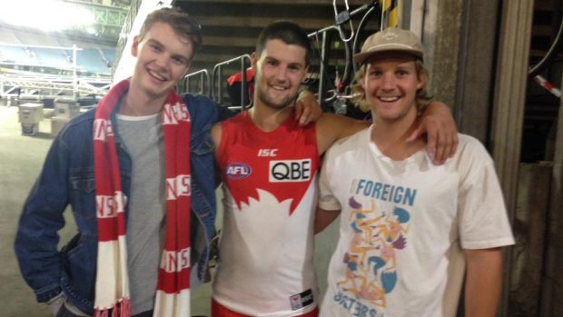 Close family: the Newman brothers of Mount Martha. Maverick (left), Nic (centre) and Josh (right) at Nic's debut game for the Swans senior team at Etihad earlier this year.