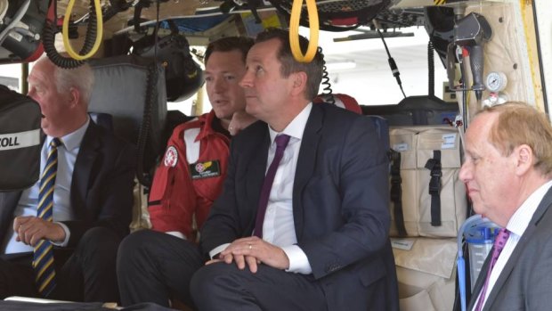 The politicians get a closer look at the chopper.