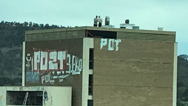 People were spotted again on the roof on Tuesday.