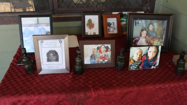 A community memorial set up in Collarenebri for Norman Boney, Sandra Boney and Roger Adams.