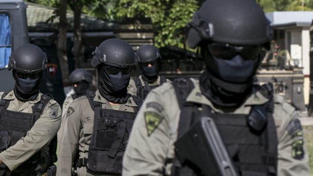 Indonesian special police hold a drill in Denpasar, Bali.