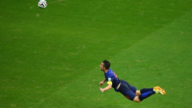 Flying Dutchman: Robin van Persie scores a stunning header.