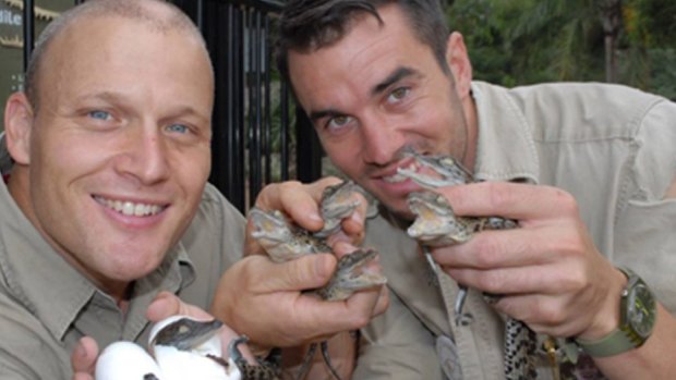 Shoalhaven Zoo owner Nick Schilko with handler Trent Burton who was bitten by a croc during a feeding show on Monday. 