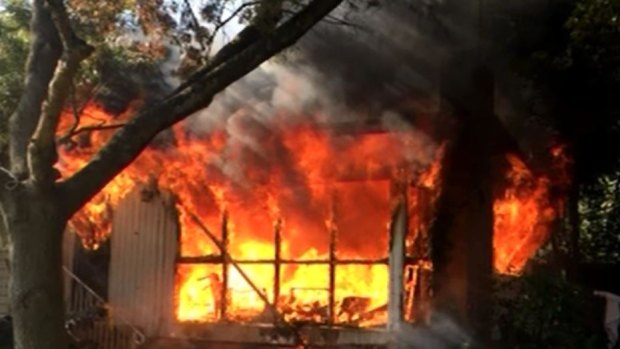 The Balwyn house was engulfed in flames when firefighters arrived.