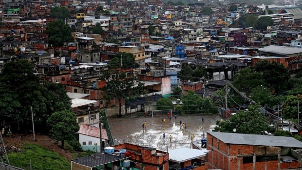 Away from the TV cameras and manicured pitches, football is a way for Brazil’s favela dwellers to escape the harsh reality of their lives.
