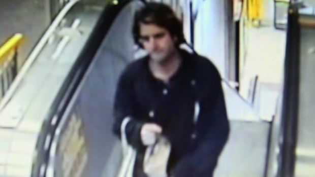 Police want to question this man over a fire at Woolloomooloo's Finger Wharf.