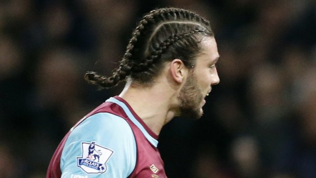 Interesting to say the least: West Ham striker Andy Carroll turned heads with his platted hairstyle.