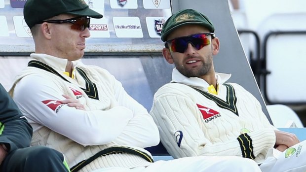 Ready to help: Chris Rogers and Nathan Lyon on the sidelines during the Derby match.